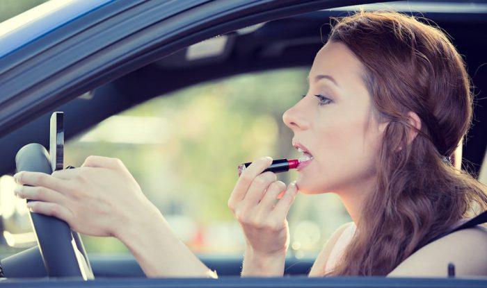 applying makeup in the car